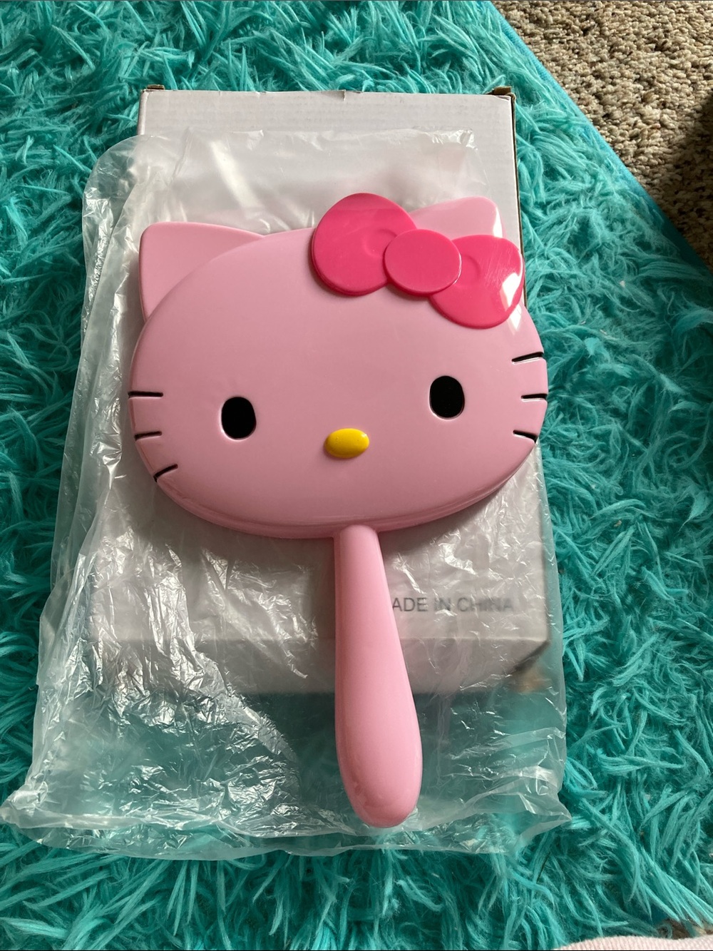 Brand New in box Hello Kitty Pink and Yellow Handheld Mirror with Bow